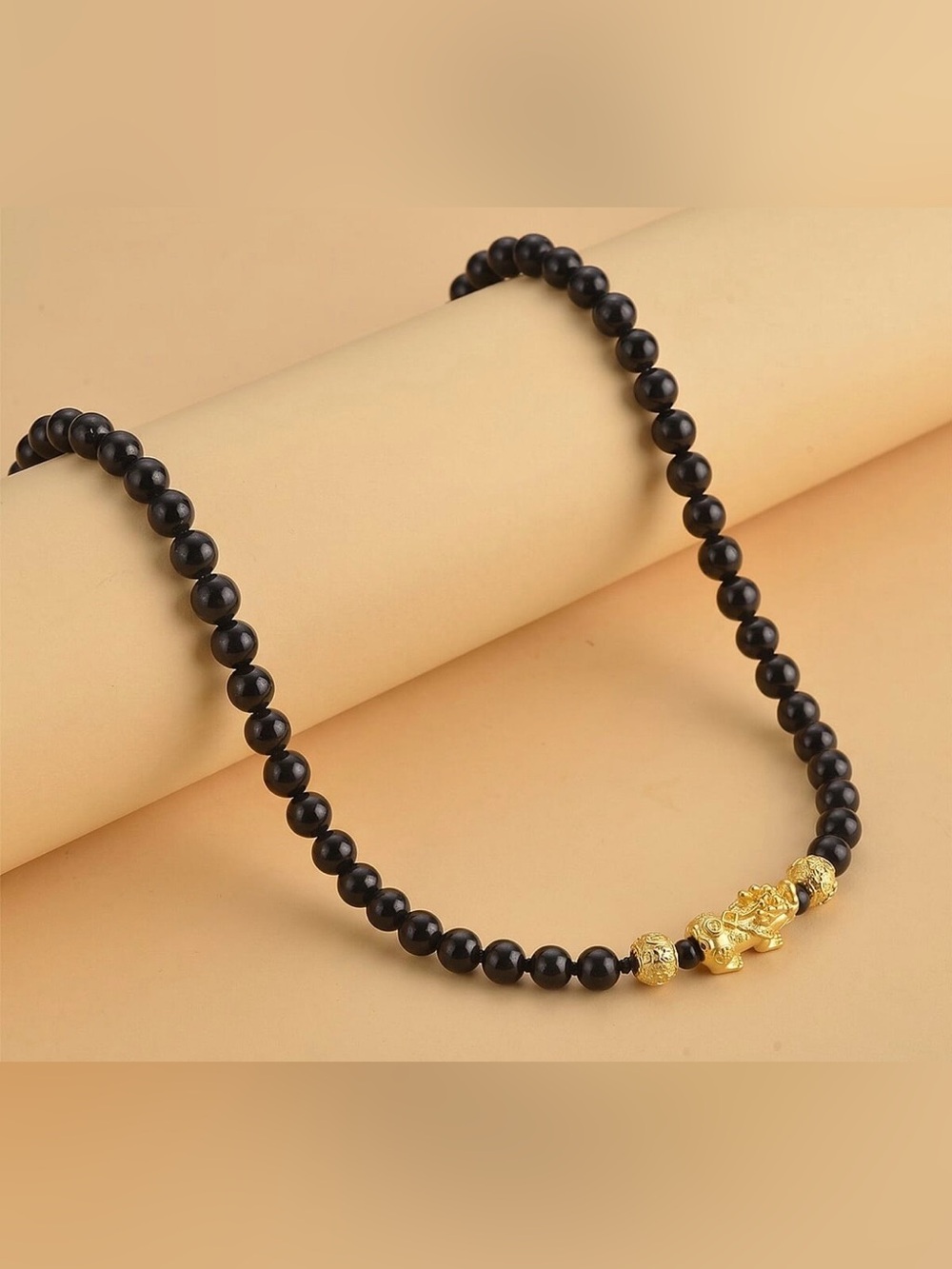 Shungite Feng Shui Necklace 20” with Pixiu Charm in Goldtone. 202 ctw